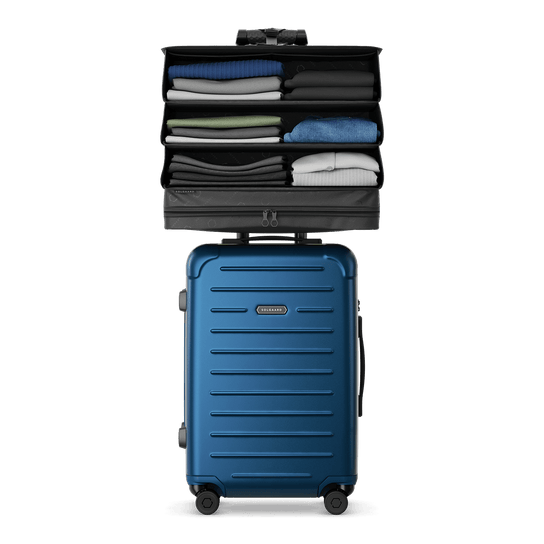 Front view of the blue Carry-On Closet Lite suitcase, size Large, with closet system
