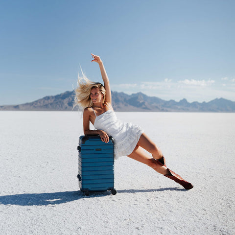 Niki Pelissier pictured with the Carry-On Closet Lite suitcase